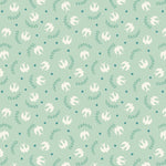 Pattern of white birds and green leaves on a light aqua background